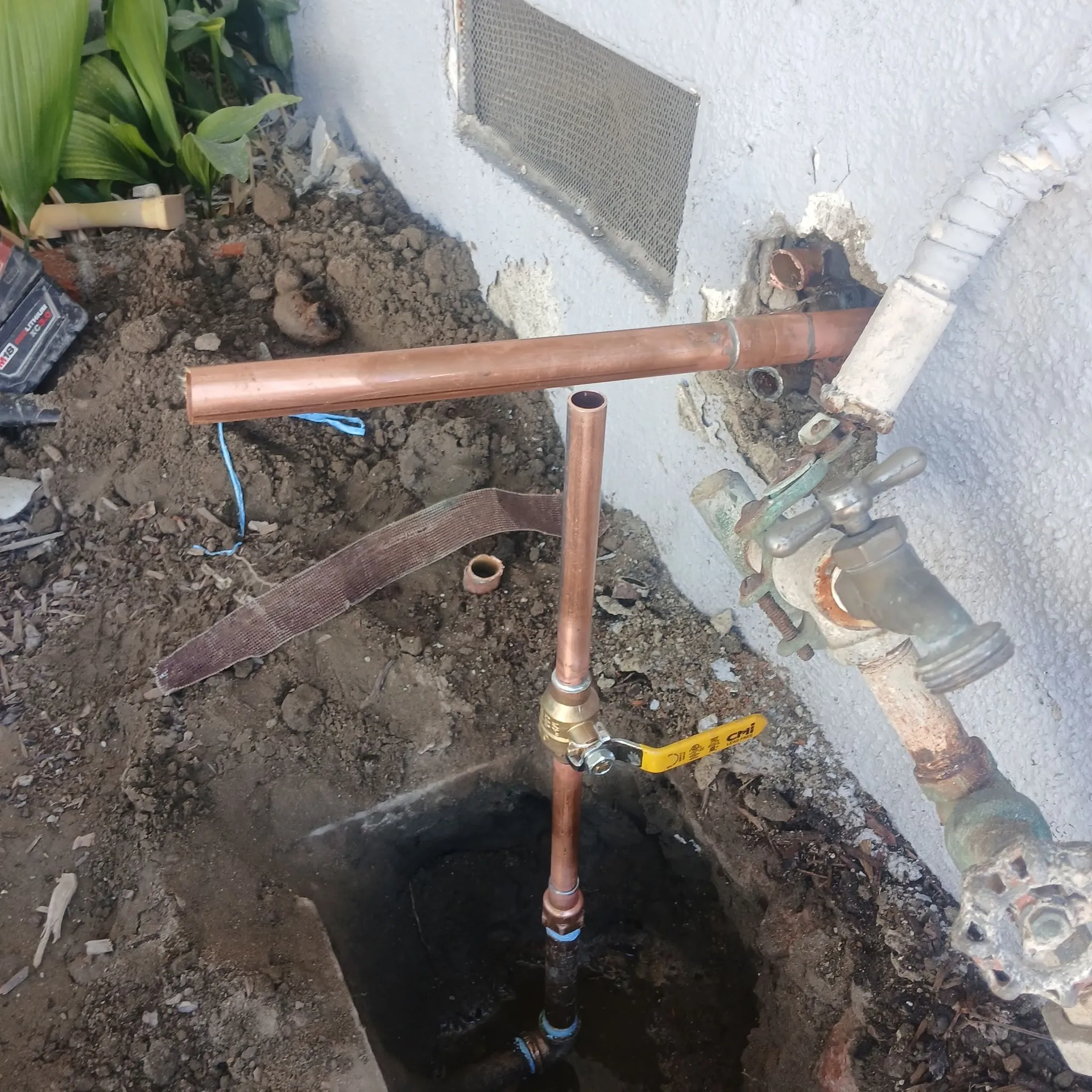 Caliber One technician completing a residential main water line repair